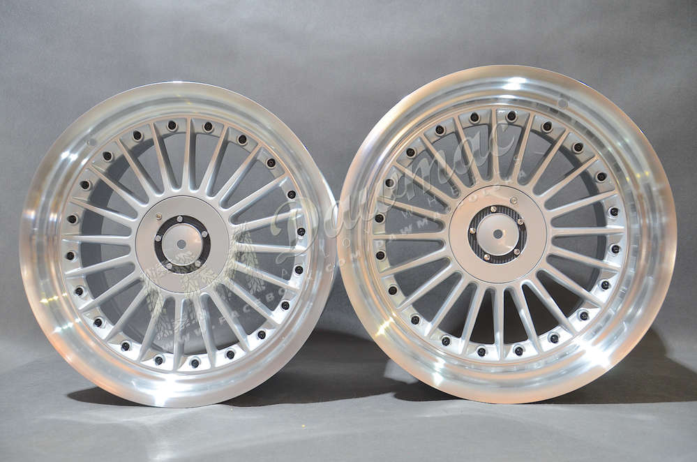 DMC03 18" 8,5J ET20 + 10J ET15 4x100/4x108 Silver Machined Lip + Black Rivet