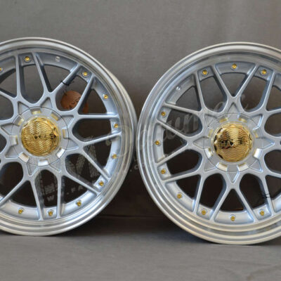 Haxer HX025 18" 9J ET20 + 10J ET15 5x112/5x120 Silver with Gold Rivets and Gold Caps